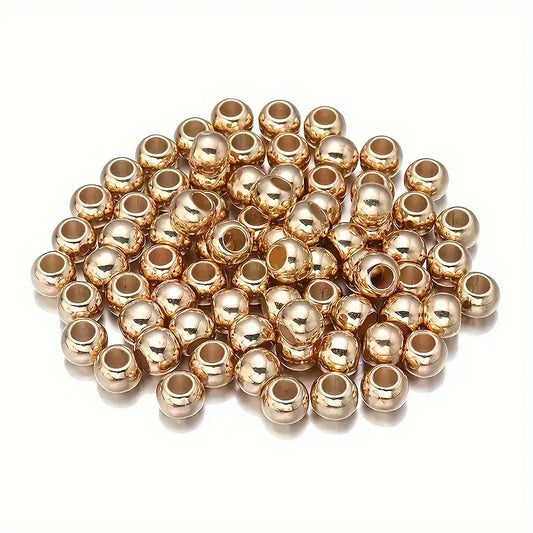 Cuentas doradas de plástico